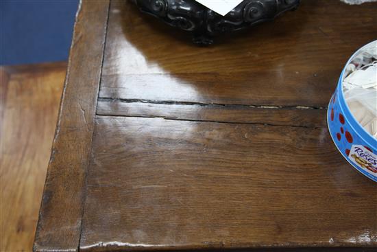 A large carved oak refectory table, 11ft 8in. x 2ft 11.5in. x 2ft 6.5in.